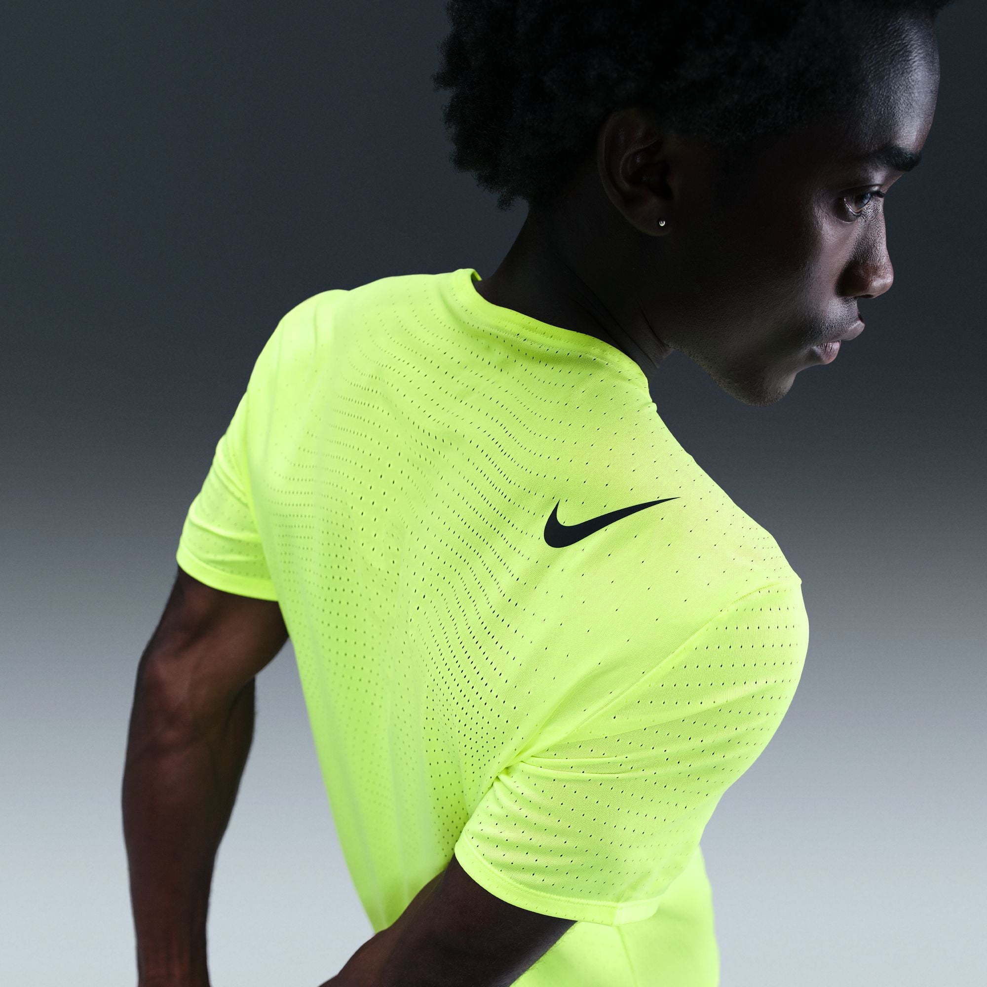 volt and black nike shirt