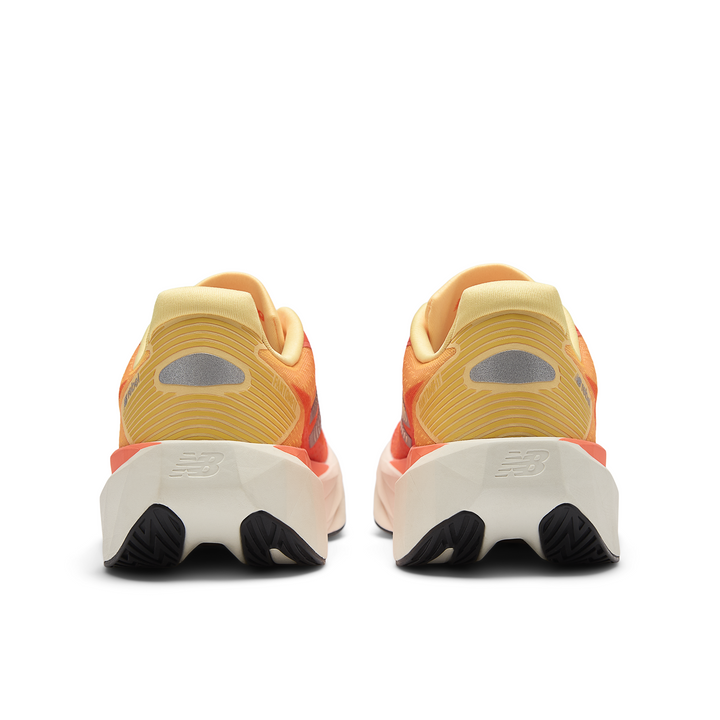 New Balance Womens FuelCell Rebel V5 Wide - D Width - Tangerine Heat/Silver Metallic - Neutral - SS26